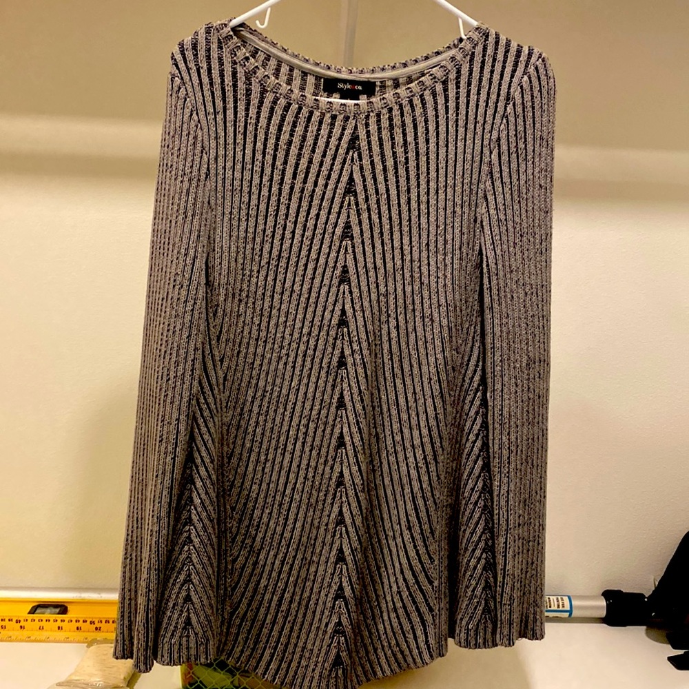 Grey , warm sweater. Slightly used.